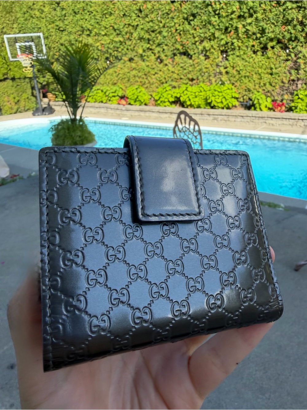 Gucci Black Embossed GG Leather Wallet